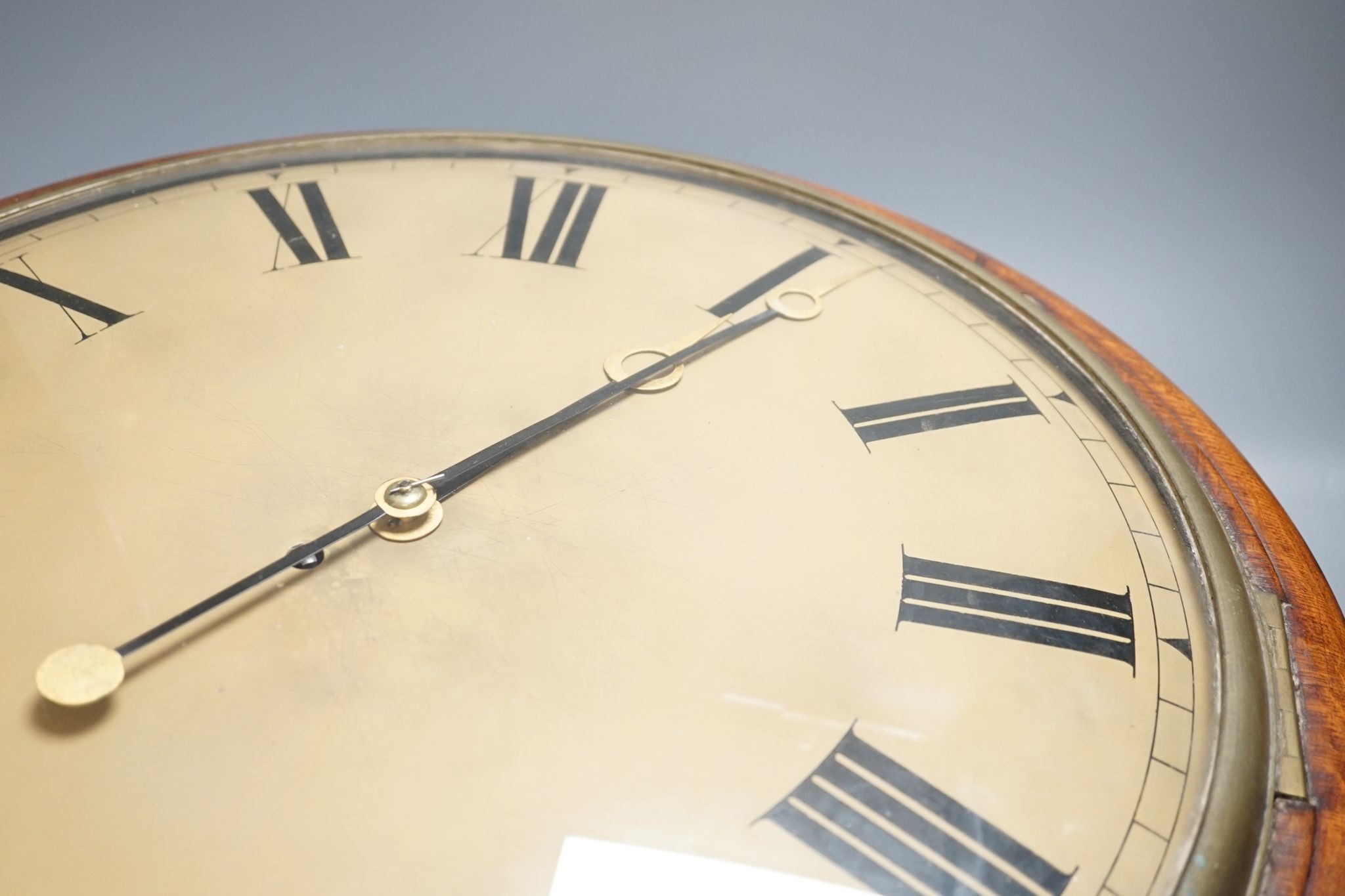 A large Victorian oak-cased dial clock, 56 cms diameter.